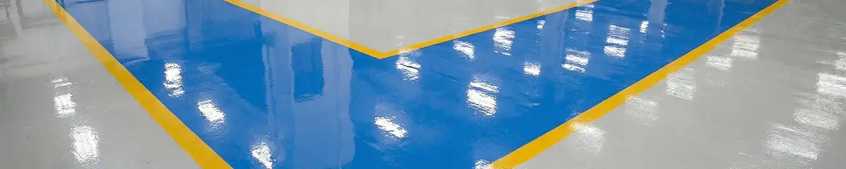 A factory floor professionally covered and marked with epoxy flooring in New Orleans, LA