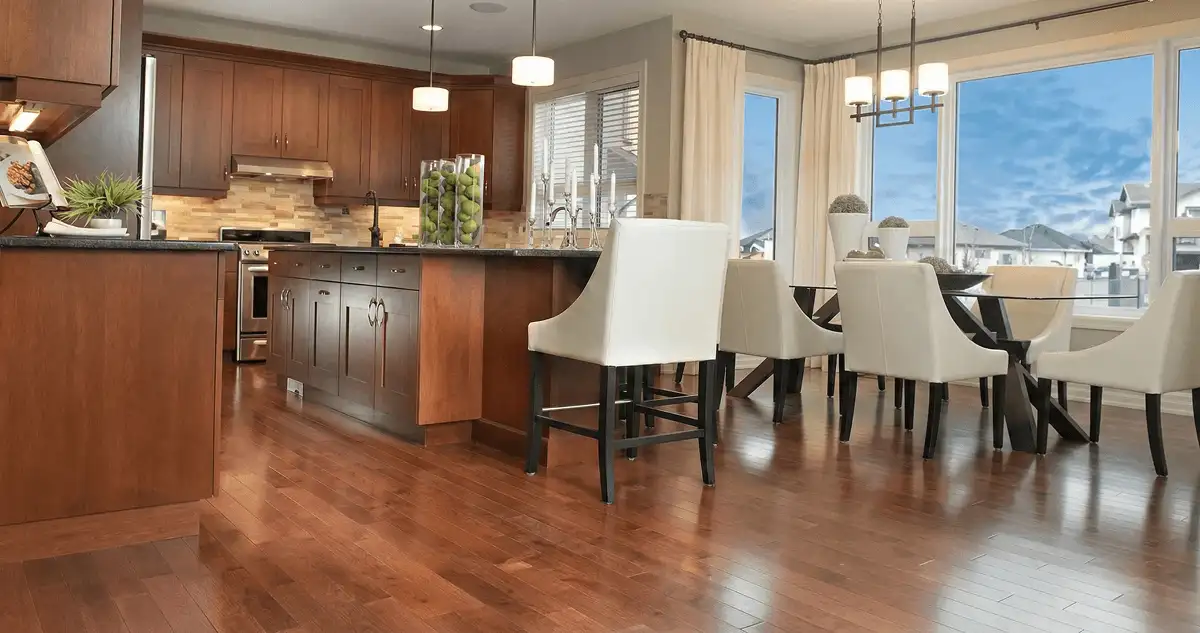 A modern kitchen with professionally installed wood flooring in New Orleans, LA