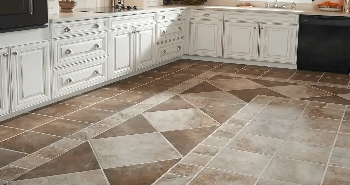 Kitchen with white cabinets and a professionally installed tile floor in New Orleans, LA